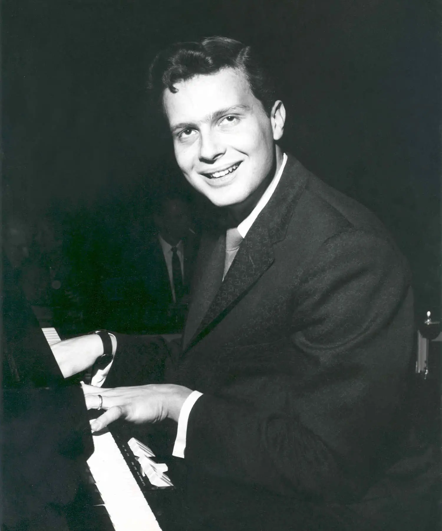 Young Peter Nero at a piano